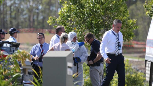 Police at the scene of a murder suicide at Matas Drive Pimpama. Picture Glenn Hampson