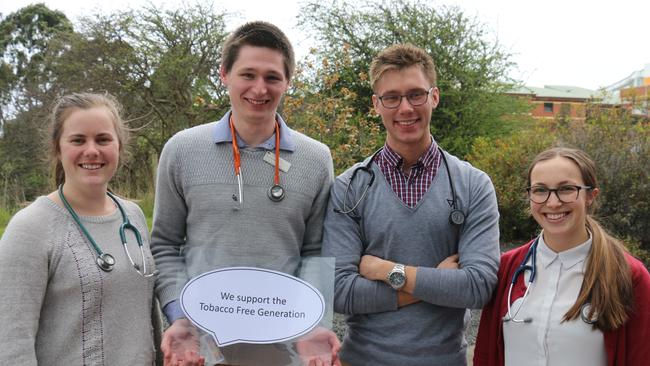 <s1>COMMITTED:  University of Tasmania final year medical students, from left, Sam Rose, Chris Etherington, Callan Oakeshott and Emily Doole support the push for a tobacco-free generation.</s1>