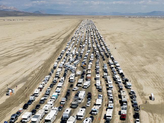 Vehicles are seen departing the Burning Man festival in Black Rock City, Nevada, U.S., September 4, 2023. REUTERS/Matt Mills McKnight