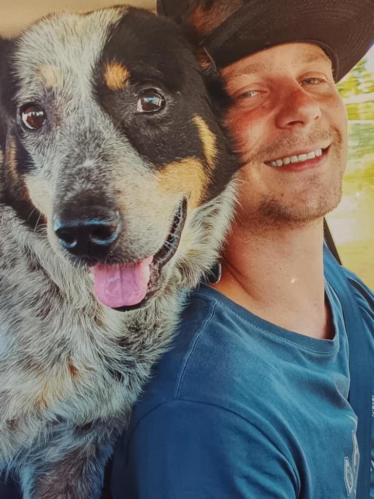 Ryan with his blue heeler dog. Picture: Supplied by family