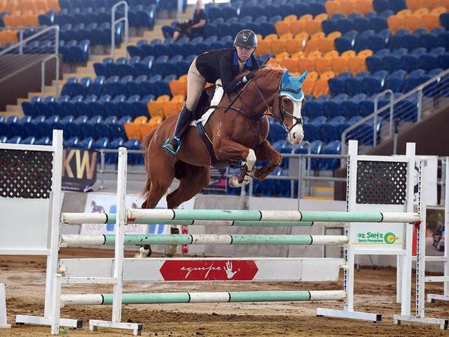 Brooke Dougall and Northern Warrior in the showjumping ring.