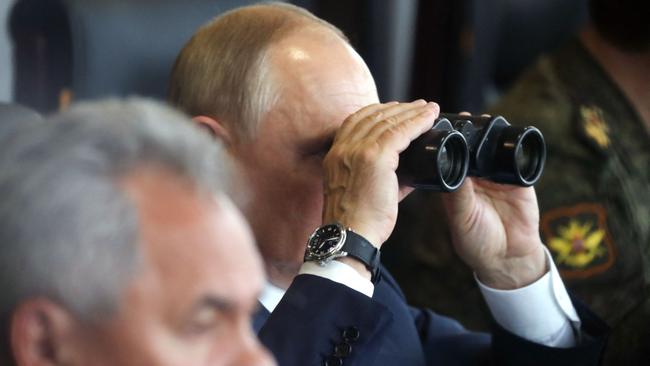 Vladimir Putin, inspecting joint military drills between Russia and Belarus this month, takes long view of strategy, embracing non-military methods of war. Picture: AFP