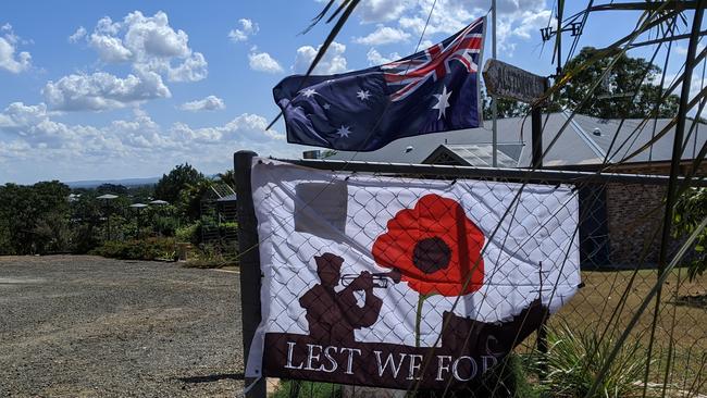 PAYING RESPECTS: John and Sue Gregor were not about to let Anzac Day pass them by. Photo: Ebony Graveur