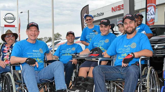 INCLUDE EVERYONE: Participants of the Wheelchair challenge parading down the main street of Gatton. Picture: Meg Bolton