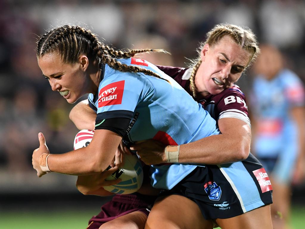 Maroons captain Ali Brigginshaw (right) tackles Isabelle Kelly of the Blues during the Women's State of Origin match between Queensland and New South Wales at Sunshine Coast Stadium. Picture: Dan Peled/Getty Images