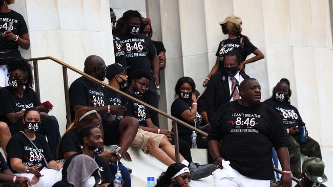 PROTEST: : The family of George Floyd listen to speakers at Lincoln Memorial during the March on Washington at the Lincoln Memorial. Picture: Michael M. Santiago/Getty Images