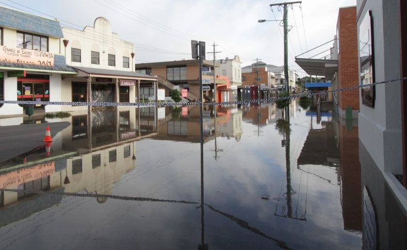 Water creeping up Bazaar St reaching the Chronicle office early Tuesday morning. Picture: Robyne Cuerel