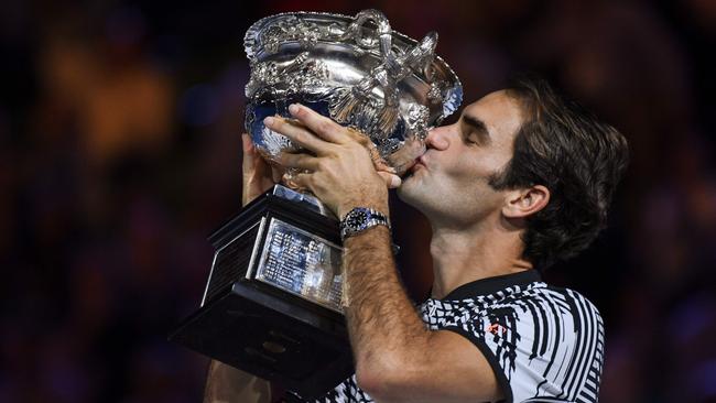 Switzerland's Roger Federer with the Australian Open trophy.