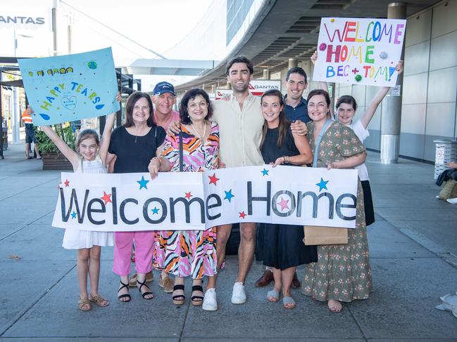 People reuniting with family after border restrictions were lifted overnight. Picture: Brad Fleet