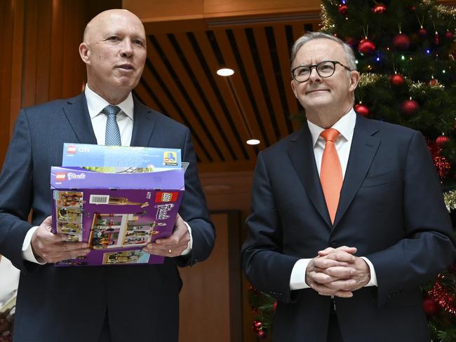 CANBERRA, AUSTRALIA - NOVEMBER 30:  Prime Minister Anthony Albanese and Leader of the Opposition Peter Dutton MP join representatives from Salvation Army and Kmart to drop off Christmas presents at the Kmart wishing tree at  at Parliament House in Canberra. Picture: NCA NewsWire / Martin Ollman