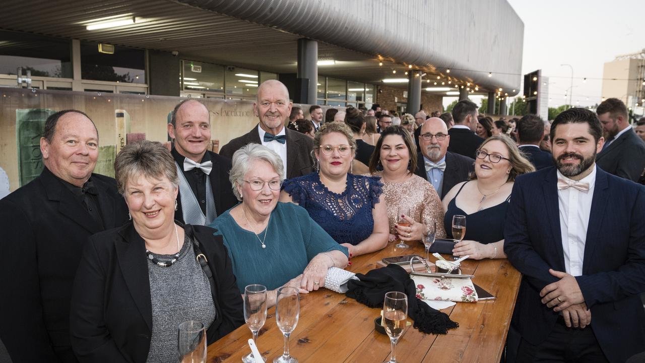 Representing Tony's Community Kitchen are (from left) Greg Kowald, Lea Barnett, Tony Hurle, Ruth Turner, Michael Glennon, Cassie Muller, Sue Gotz, Wayne Barnett, Beth Webb and Andrew Stone at the Focus HR Business Excellence Awards 2023 hosted by Toowoomba Chamber at Rumours International, Saturday, October 21, 2023. Picture: Kevin Farmer