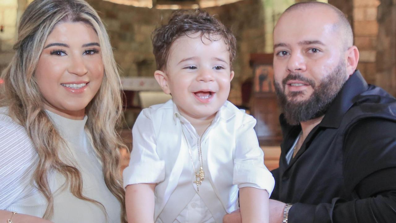 Sarah Moujalli with her son Isaiah and husband Ghosn Ghosn who died after he went missing in NSW floodwaters.