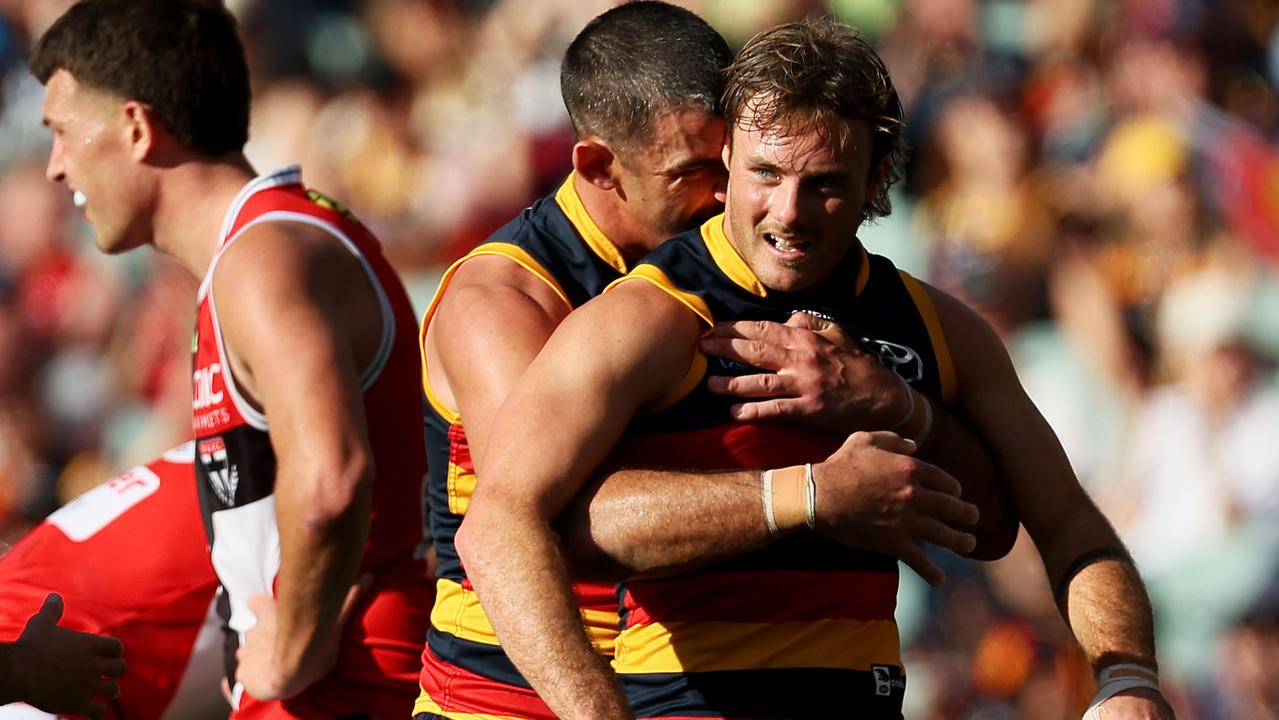 ADELAIDE, AUSTRALIA - MAY 14: Taylor Walker and Luke Pedlar of the Crows celebrate a goal during the 2023 AFL Round 09 match between the Adelaide Crows and the St Kilda Saints at Adelaide Oval on May 14, 2023 in Adelaide, Australia. (Photo by James Elsby/AFL Photos via Getty Images)