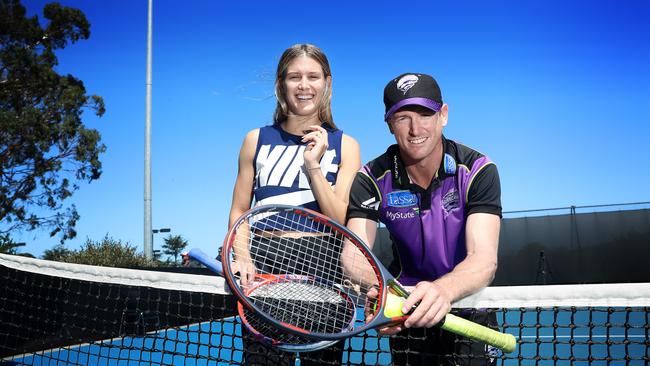 Canadian tennis player Eugenie Bouchard and Hurricanes captain George Bailey had a hit of tennis at the Hobart International. Picture: LUKE BOWDEN