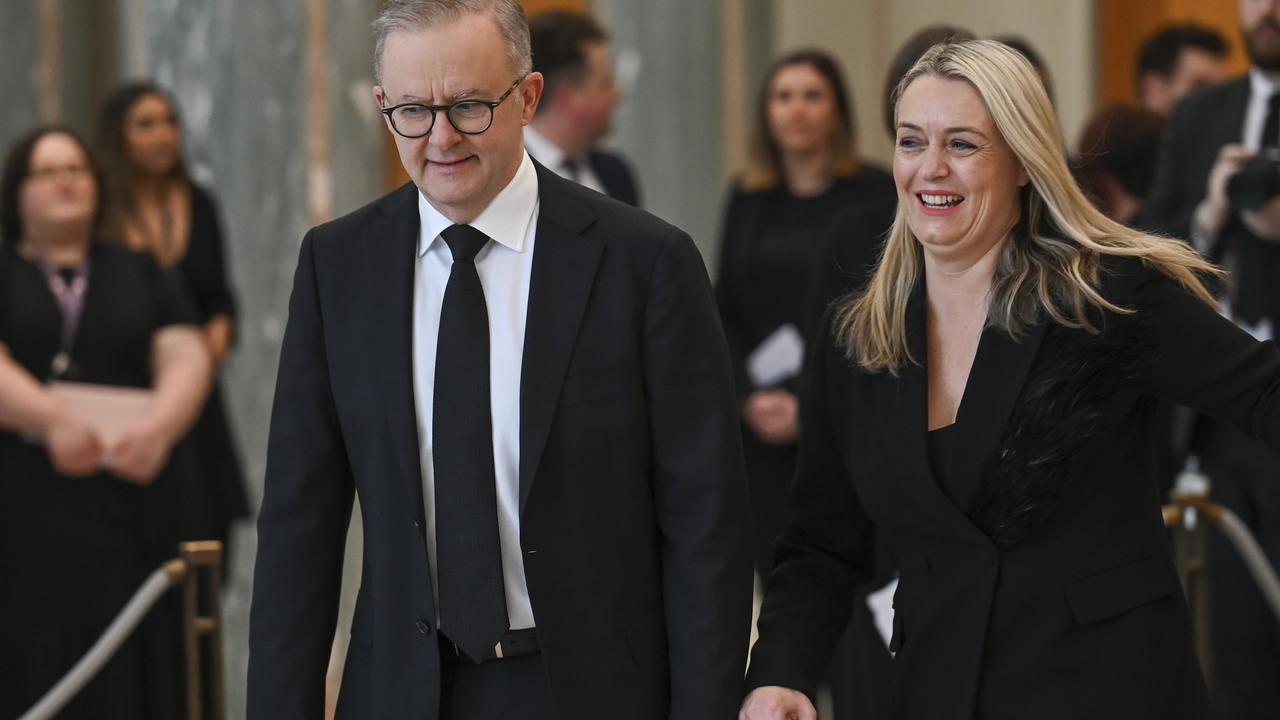 Anthony Albanese and his partner Jodie Haydon at the National Memorial Service for Queen Elizabeth II at Parliament House this week. Picture: Martin Ollman/Getty Images