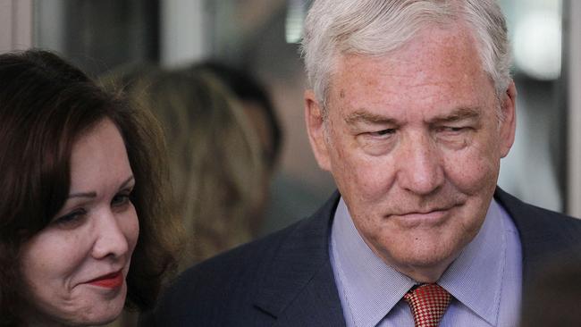 Conrad Black, pictured with wife Barbara Amiel, outside a US court in 2010.