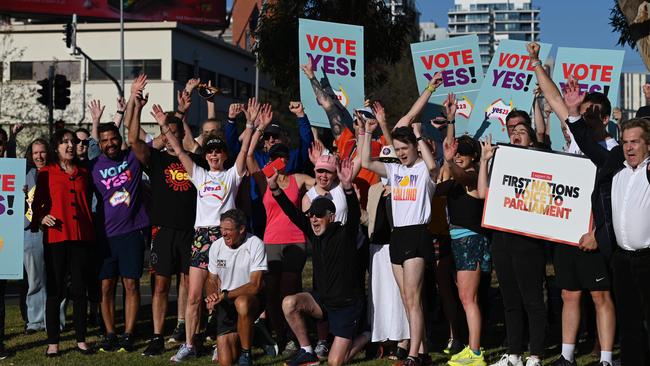 Pat Farmer's (kneeling in front) 14,400km Run for the Voice in Adelaide. Picture: NCA NewsWire/Naomi Jellicoe