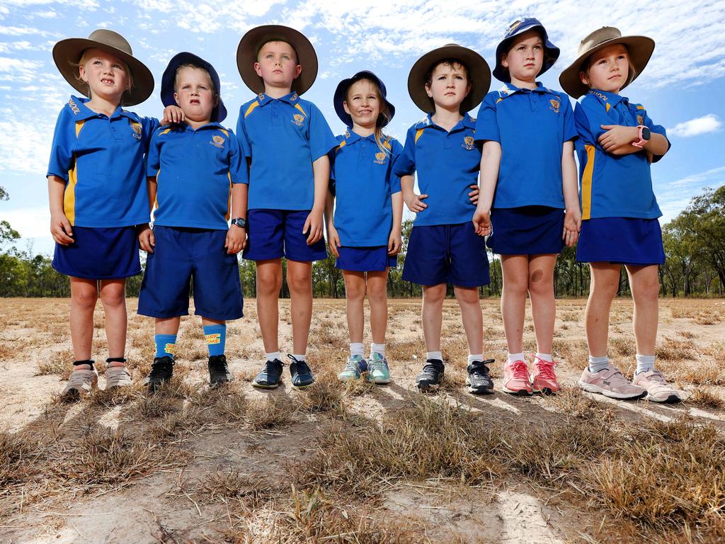 Valkyrie State School students Koko Black, Year 2, Toby Black, Year 1, Jaxon Parmenter, Year 3, Brooke Hanrahan, Year 2, Ari Michelmore, Year 1, Ivy Michelmore, Year 3, and Lacey Hanrahan, Year 4, are unable to use the oval due to a lack of water. Picture: Tara Croser