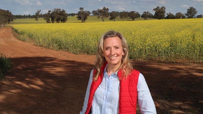 Kristina Hermanson, Nuveen Natural Capital, in canola fields near Wagga Wagga, NSW. Picture: Yuri Kouzmin