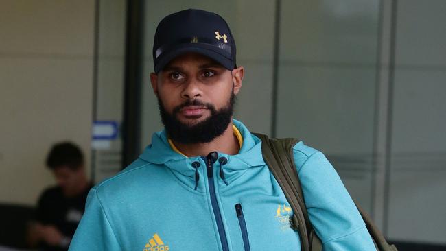 Boomers star Patty Mills at Brisbane airport on Wednesday.