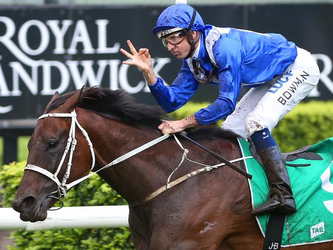 Jockey Hugh Bowman on Winx gestures as they win the TAB Chipping Norton Stakes Race during the TAB Chipping Norton Stakes Day at Royal Randwick race course in Sydney, Saturday, Feb. 25, 2017. Their race win today is their 15th consecutive. (AAP Image/David Moir) NO ARCHIVING