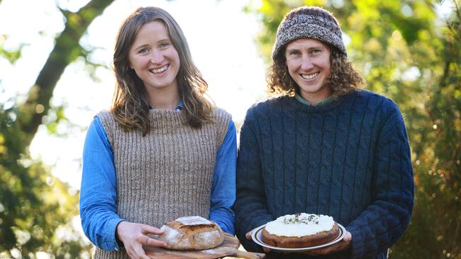 Ian Congdon and Courtney Young mill grains from Ian's family’s farm. Picture: Zoe Phillips