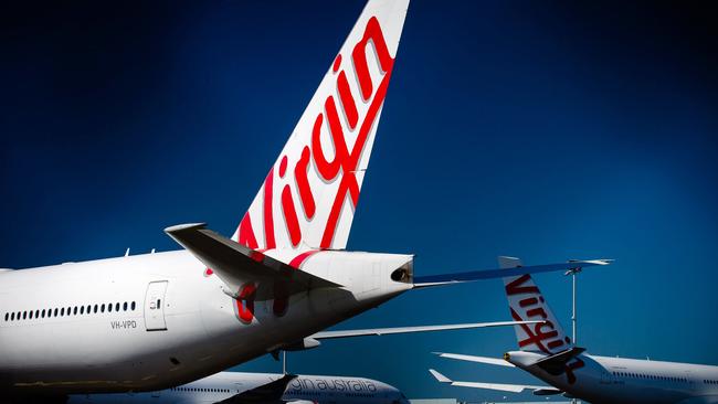 Virgin Australia aircraft parked at Brisbane Airport. Picture: Patrick Hamilton/AFP