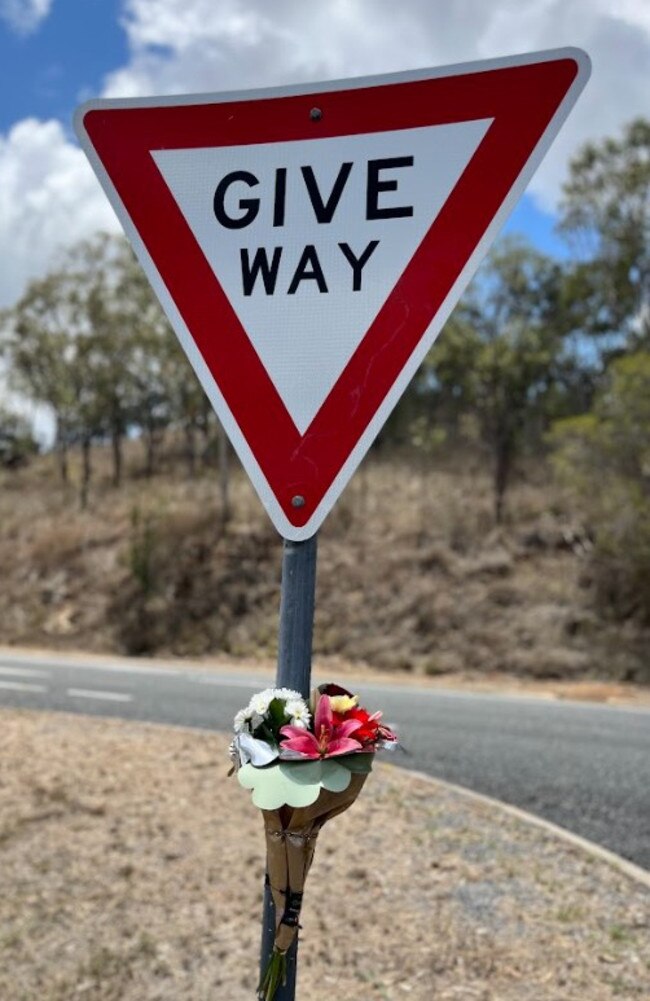 A floral tribute to Anuisha Bone can be seen tied to a give way sign at Access Three on Yeppoon Rd.
