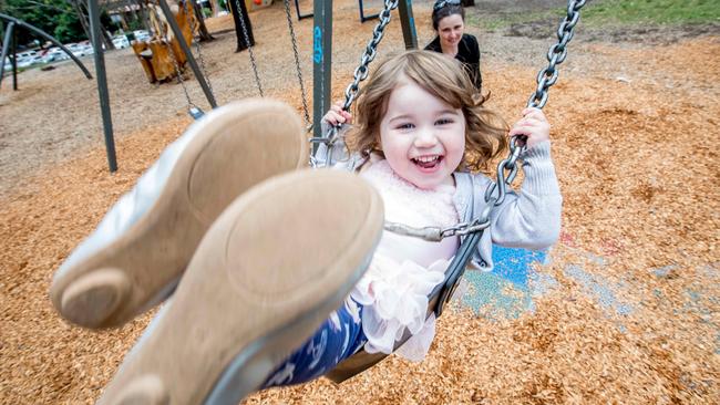 Two year old Hazel Everett enjoys a swing in Eltham Park with mum Alex Everett. Picture: Tim Carrafa