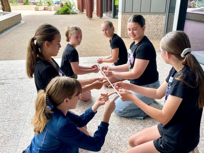 Students participating in a STEM Changemakers Workshops help at James Cook University