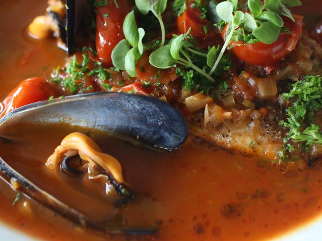 For TasWeekend. Flathead in South Hobart. Grilled Blue Eye Trevalla with Spring Bay Mussels, aqua pazza , baby basil and served with house bread.