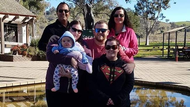 Jesy Burton (front right) with father Jim, mum Leanne, brother Daniel and sister-in-law Tanya Rudloff and children. Picture: Supplied