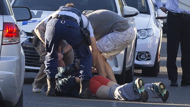 Police arrest the man in Yagoona after his Hino truck ran out of petrol following a five-hour chase.