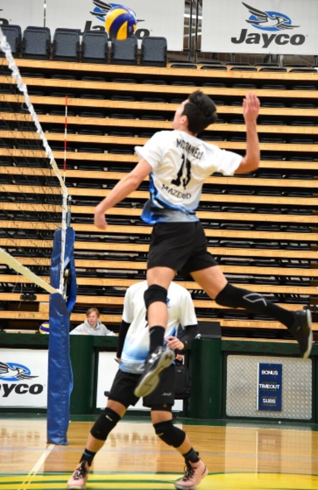 Lachie McDonnell playing volleyball for Monash.