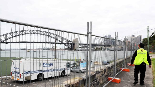 Fencing up at Blues Point as New Years Eve celebrations around Sydney Harbour have been cancelled due to COVID-19. Picture: Tim Hunter.