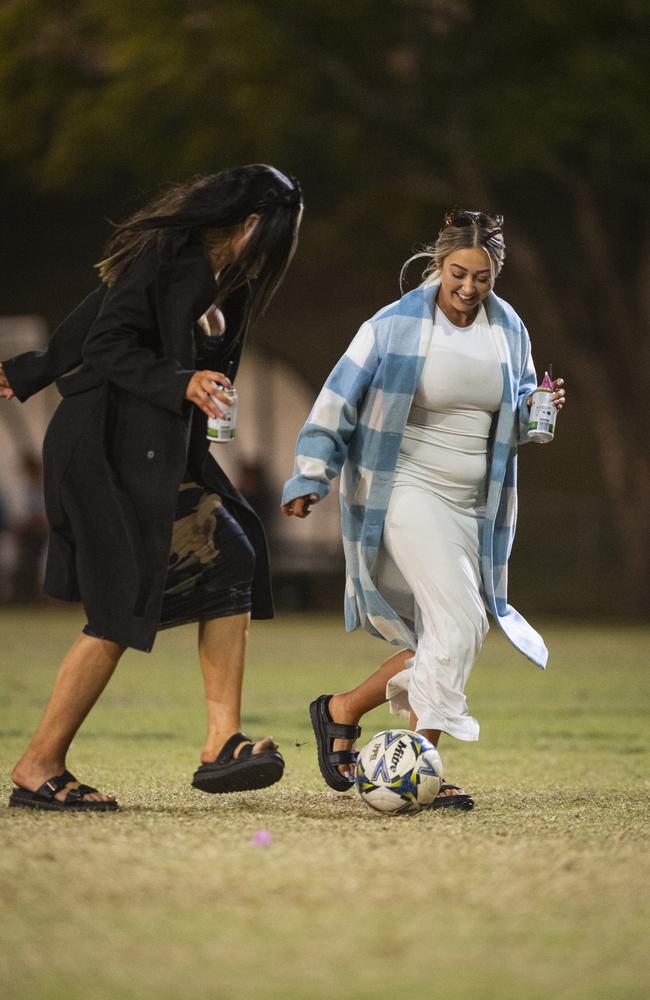 Tahlia Curd (left) and Jessica Palmer having a kick at Sparkling Soiree Ladies Day at Willowburn Football Club, Saturday, August 3, 2024. Picture: Kevin Farmer