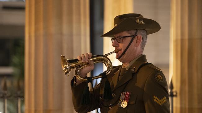 The Last Post is played during the Anzac Day Wreath Laying Ceremony at The Shrine of Remembrance in Brisbane, Saturday, April 25, 2019. Anzac Day is a national day of remembrance to commemorate the service and sacrifice of Australian and New Zealand service men and women. Due to COVID-19 restrictions marches and commemorative services have been banned for the first time in more than a century. (AAP Image/Jono Searle) NO ARCHIVING