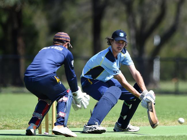 Baxter batsman Bobby Parslow and Peninsula Old Boys wicket keeper Tom Labrooy.