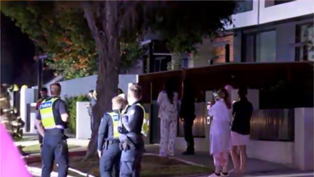 Woman jumps off balcony to escape blaze