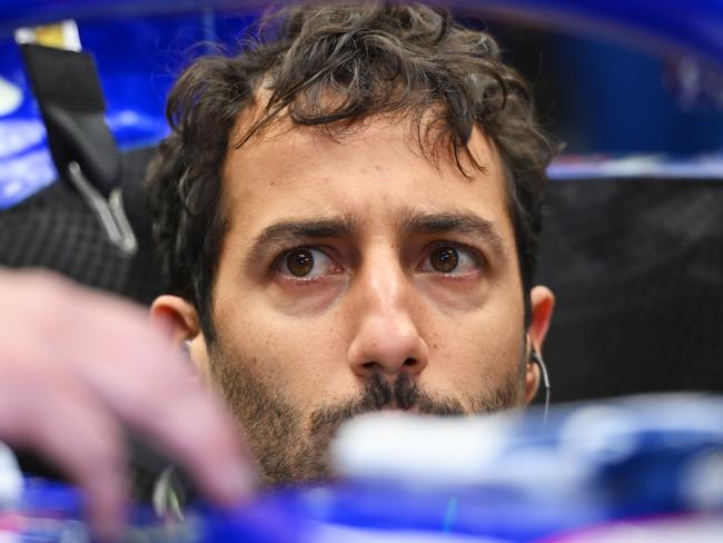 BAHRAIN, BAHRAIN - MARCH 02: Daniel Ricciardo of Australia and Visa Cash App RB prepares to drive in the garage during the F1 Grand Prix of Bahrain at Bahrain International Circuit on March 02, 2024 in Bahrain, Bahrain. (Photo by Rudy Carezzevoli/Getty Images)