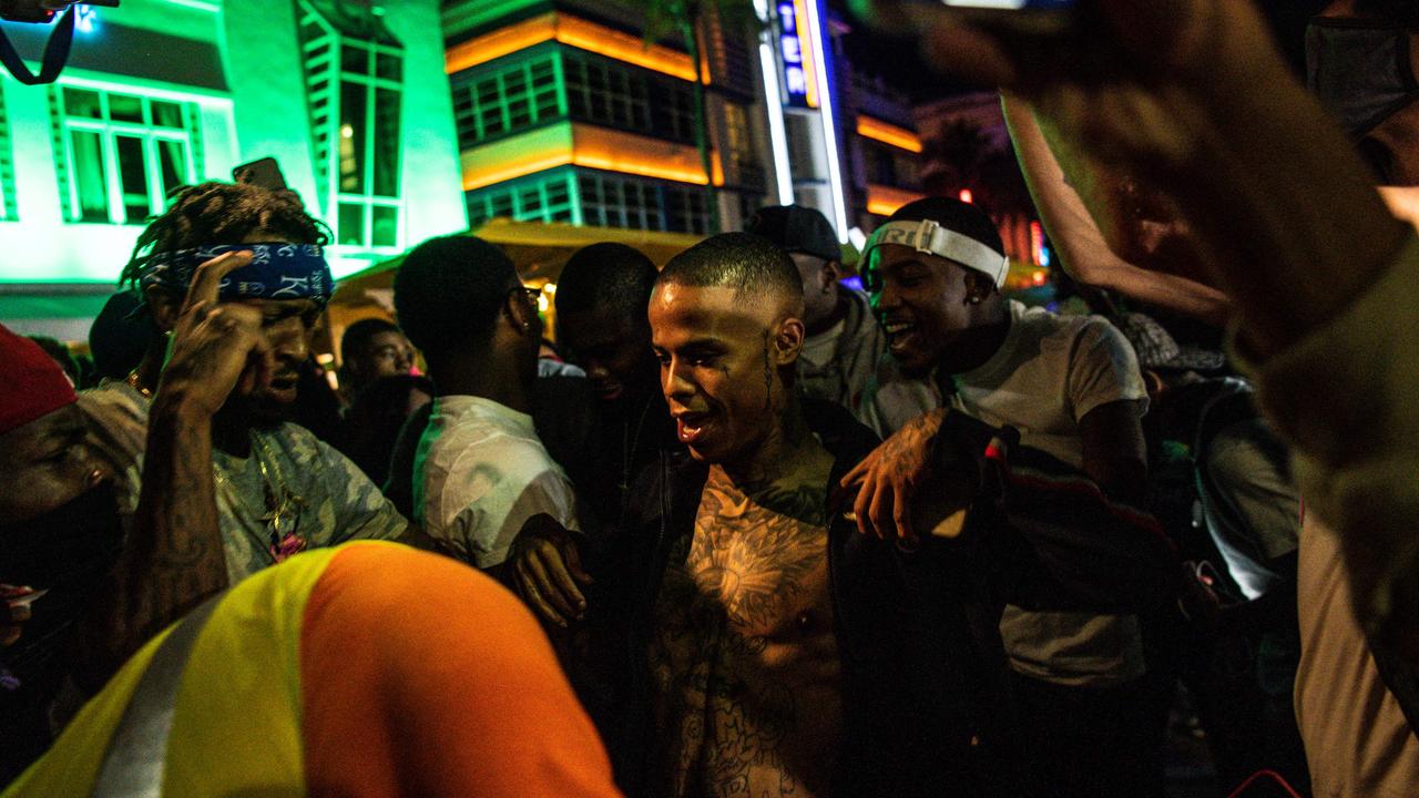 Despite strict COVID measures amid new waves of infection, the US city of Miami was overrun by massive crowds of young people celebrating Spring Break, sparking a state of emergency. Picture: AFP