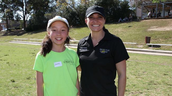 Invictus Games Sydney ambassador Gwen Cherne with 11-year-old Jasmine Wong during the Invictus Games Countdown Kids Sports Challenge at Castle Hill High School. Pictures: Annika Enderborg