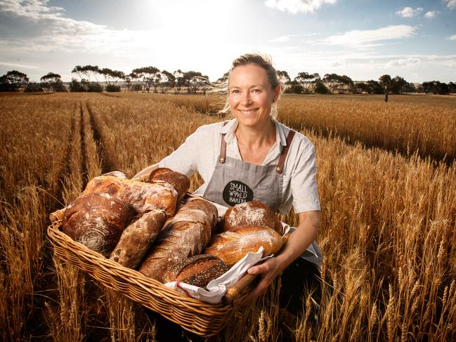 5/11/2018 Emily Salkeld from Small World Bakery with bread in some of her wheat crops at Langhorne Creek. Picture MATT TURNER.