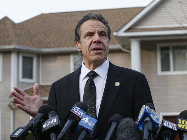 New York Governor Andrew Cuomo outside the home of rabbi Chaim Rottenbergin Monsey, in New York where a man committed a mass stabbing. Picture: AFP