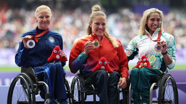 De Rozario (right) added to her huge medal haul with bronze in the T54 5000m. (Photo by Tasos Katopodis/Getty Images)