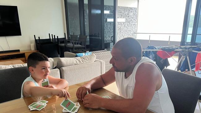 Damian, Katie, Andre, Danny, Luca, Milan and Paul Mandarano got stuck indoors during their holidays on Hamilton Island as tropical cyclone Kirrily is forecasted to land in Townsville on Thursday night. Picture: Katie Mandarano