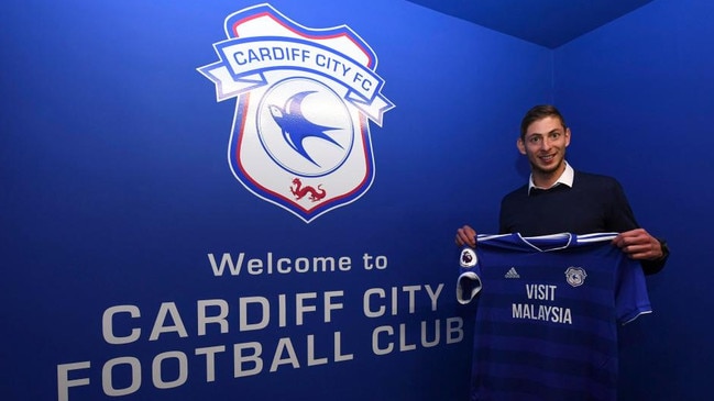 Emiliano Sala poses with his Cardiff shirt after signing for the club over the weekend