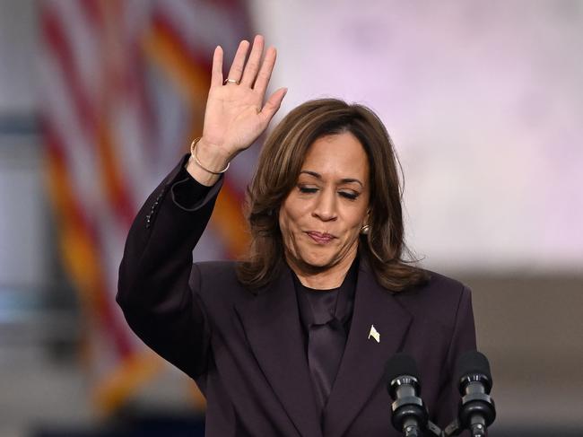 Vice President Kamala Harris waves at supporters after her concession speech. (Photo by SAUL LOEB/AFP)