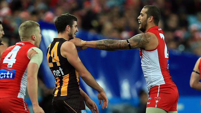 Buddy Franklin with former teammate Ben Stratton, who may take the job on the Swans star this weekend.