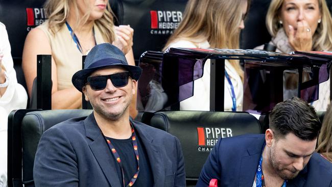 Ian Thorpe watches the women’s final in the on court seats. Pic: TENNIS AUSTRALIA/ FIONA HAMILTON